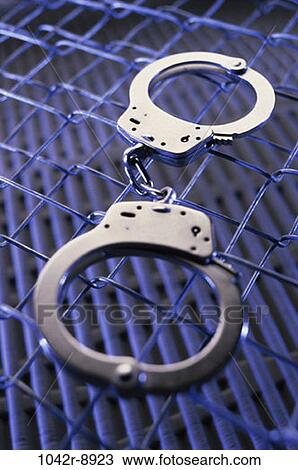 fence, law, still life, prison, bars, crime, handcuffs View Large Photo Image Stock Image - fence, law, still life, prison, bars, crime, handcuffs. Fotosearch