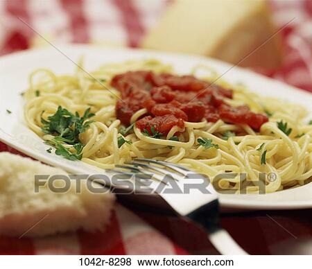 Stock Photo - fork, plate, bread, food, sauce, spaghetti, Starchy foods. Fotosearch