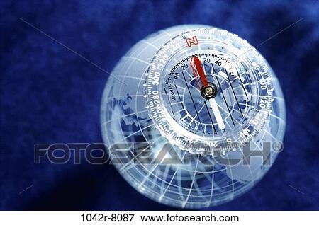 Stock Photo - globe, still life, direction, compass, Business globes maps. Fotosearch