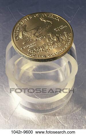 Stock Image - gold, stand, finance, still life, currency, coin, Finance gold. Fotosearch