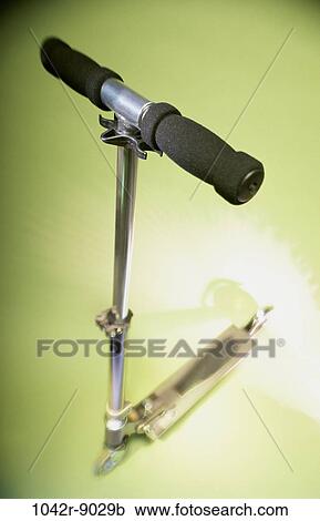Stock Image - handlebar, still life, toy, scooter, handles, wheeled, wheeled toy. Fotosearch