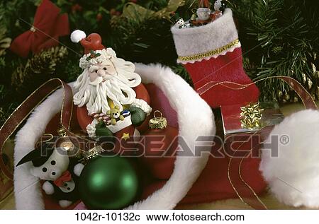 Stock Image - hat, Christmas, decorations, still life, holiday, ornaments, Santa. Fotosearch
