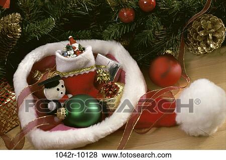 hat, Christmas, decorations, still life, holiday, ornaments, Santa View Large Photo Image Stock Photo - hat, Christmas, decorations, still life, holiday, ornaments, Santa. Fotosearch