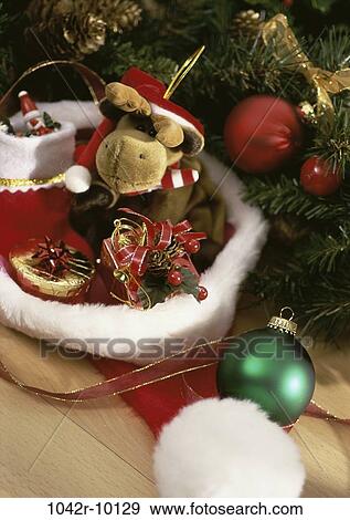 Stock Photo - hat, Christmas, decorations, still life, holiday, ornaments, Santa. Fotosearch