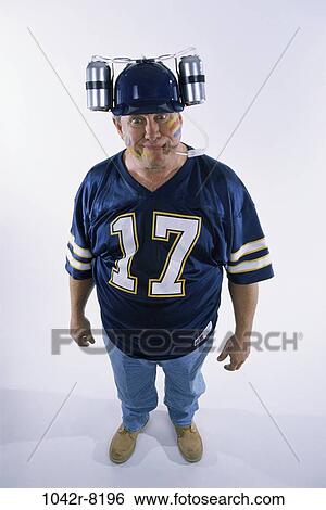 Stock Photograph - hat, drinking, straw, sports, Middle-aged, humorous. Fotosearch