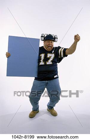 hat, excitement, excited, holding, sports, Middle-aged View Large Photo Image Stock Photo - hat, excitement, excited, holding, sports, Middle-aged. Fotosearch