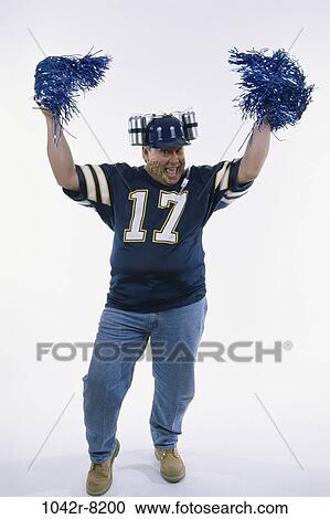 hat, sports, Middle-aged, cheering, jeans, humorous View Large Photo Image Stock Image - hat, sports, Middle-aged, cheering, jeans, humorous. Fotosearch