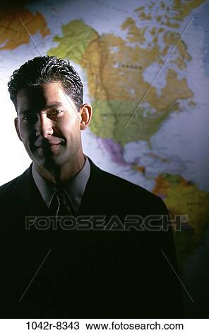 Hispanic, business, global, businessman, indoors, young adult View Large Photo Image Stock Image - Hispanic, business, global, businessman, indoors, young adult. Fotosearch