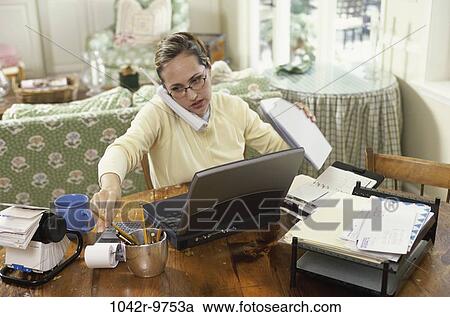 home, woman, telephone, calculator, talking, computer, laptop View Large Photo Image Stock Image - home, woman, telephone, calculator, talking, computer, laptop. Fotosearch