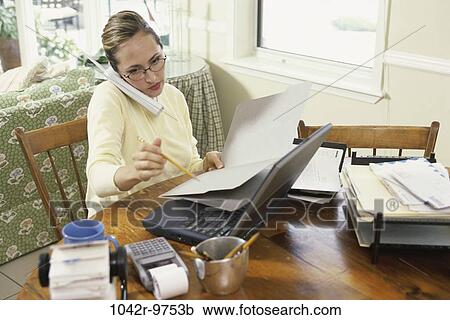 home, woman, telephone, talking, pencil, computer, laptop View Large Photo Image Stock Image - home, woman, telephone, talking, pencil, computer, laptop. Fotosearch