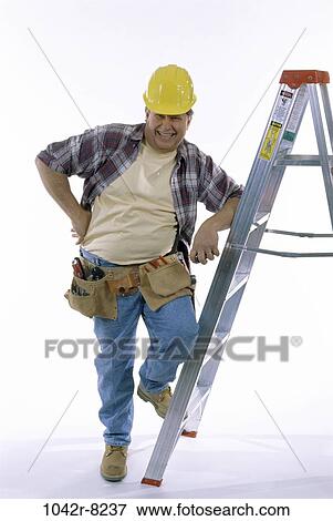 Stock Photo - industry, construction, ladder, worker, leaning, Middle-aged. Fotosearch