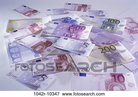 Stock Photo - industry, finance, background, still life, currency, euro, scattered. Fotosearch