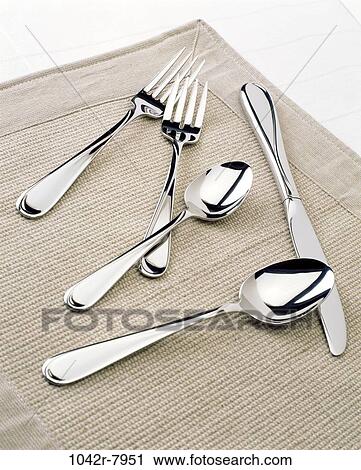 Stock Image - knife, silverware, still life, place mat, spoons, forks, Household still lifes. Fotosearch