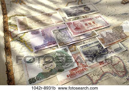 Stock Image - map, global, finance, still life, currency, travel, Finance paper money. Fotosearch