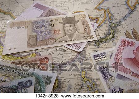 map, global, finance, still life, currency, travel, Finance paper money View Large Photo Image Stock Photo - map, global, finance, still life, currency, travel, Finance paper money. Fotosearch