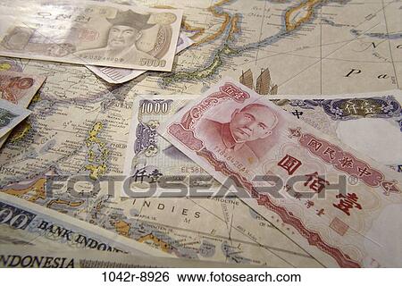 Stock Photograph - map, global, finance, still life, currency, travel, Finance paper money. Fotosearch