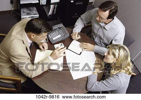 meeting, desk, consultation, business, Middle-aged, indoors, occupation View Large Photo Image Stock Photograph - meeting, desk, consultation, business, Middle-aged, indoors, occupation. Fotosearch