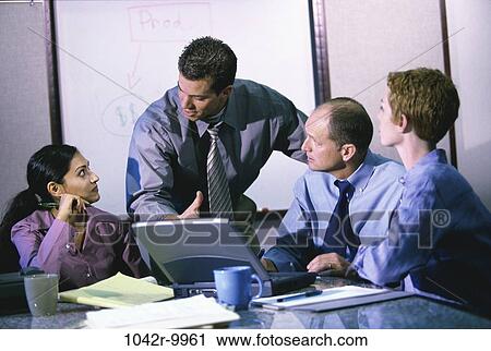 meeting, group, multiethnic, men, women, talking, papers View Large Photo Image Stock Image - meeting, group, multiethnic, men, women, talking, papers. Fotosearch