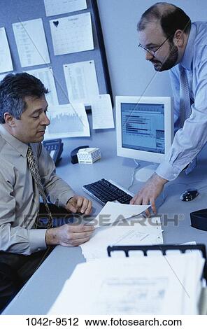 meeting, men, desk, consultation, Hispanic, computer, business View Large Photo Image Stock Image - meeting, men, desk, consultation, Hispanic, computer, business. Fotosearch