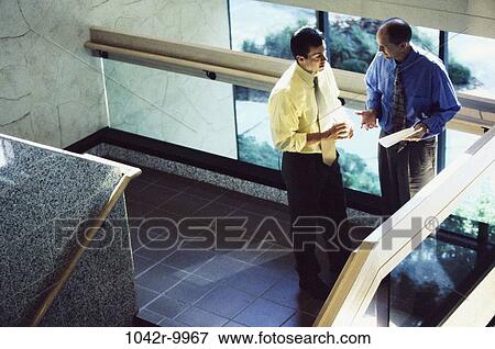 meeting, multiethnic, men, talking, business, Middle-aged, businessmen View Large Photo Image Stock Photo - meeting, multiethnic, men, talking, business, Middle-aged, businessmen. Fotosearch