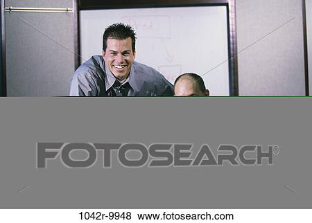 Stock Photo - men, desk, computer, laptop, business, Middle-aged, businessmen. Fotosearch