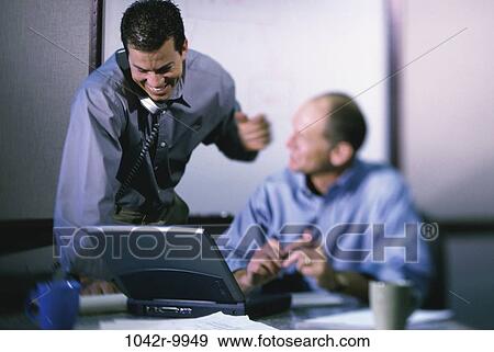 men, desk, telephone, talking, computer, laptop, phone View Large Photo Image Stock Photo - men, desk, telephone, talking, computer, laptop, phone. Fotosearch