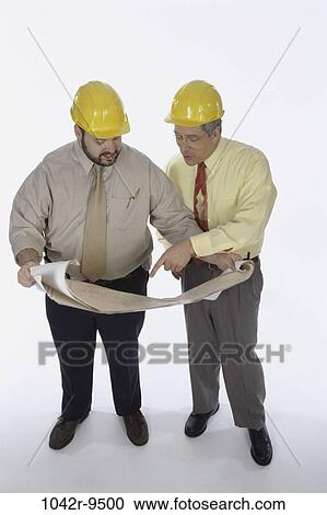 men, industry, construction, Middle-aged, teamwork, blueprints, workers View Large Photo Image Stock Image - men, industry, construction, Middle-aged, teamwork, blueprints, workers. Fotosearch