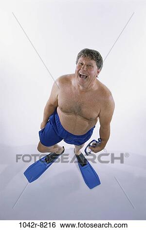 Middle-aged, humor, snorkel, Caucasian, flippers, swimwear View Large Photo Image Stock Photograph - Middle-aged, humor, snorkel, Caucasian, flippers, swimwear. Fotosearch