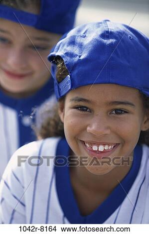 Picture - multiethnic, people, baseball, outdoors, children, girls, uniform. Fotosearch