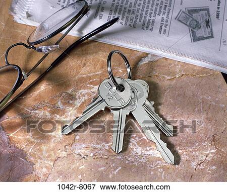 newspaper, eyeglasses, papers, business, still life, keys, documents View Large Photo Image Stock Photo - newspaper, eyeglasses, papers, business, still life, keys, documents. Fotosearch