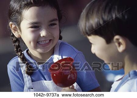 people, apple, outdoors, children, food, headshot, dessert View Large Photo Image Stock Image - people, apple, outdoors, children, food, headshot, dessert. Fotosearch