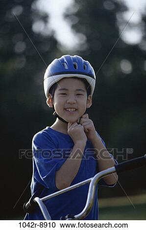 people, Asian, bicycle, helmet, boy, outdoors, bike View Large Photo Image Stock Image - people, Asian, bicycle, helmet, boy, outdoors, bike. Fotosearch