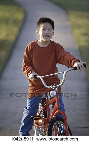 Stock Image - people, Asian, bicycle, riding, boy, outdoors, bike. Fotosearch