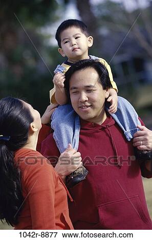 people, Asian, outdoors, carrying, family, brunette View Large Photo Image Stock Photo - people, Asian, outdoors, carrying, family, brunette. Fotosearch