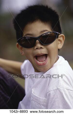 people, Asian, sunglasses, boy, outdoors, child, posing View Large Photo Image Stock Image - people, Asian, sunglasses, boy, outdoors, child, posing. Fotosearch