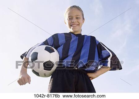 Stock Image - people, ball, girl, outdoors, sports, competition, child. Fotosearch