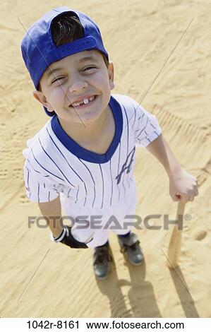 Stock Image - people, bat, Hispanic, ball, baseball, boy, outdoors. Fotosearch