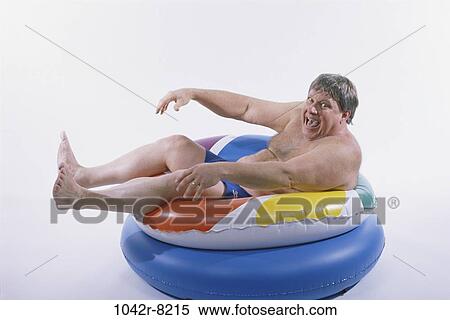 people, beach, Middle-aged, humor, brunette, character View Large Photo Image Stock Photography - people, beach, Middle-aged, humor, brunette, character. Fotosearch