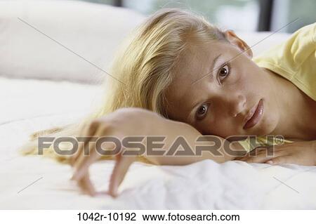 people, blond, bored, indoors, teenager, female View Large Photo Image Stock Image - people, blond, bored, indoors, teenager, female. Fotosearch