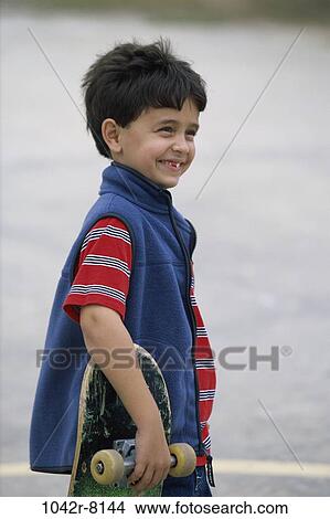 people, boy, outdoors, child, brunette, hobby, skateboard View Large Photo Image Picture - people, boy, outdoors, child, brunette, hobby, skateboard. Fotosearch