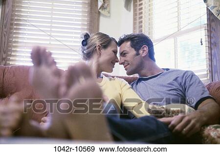 people, couple, feet, affection, indoors, affectionate View Large Photo Image Stock Photo - people, couple, feet, affection, indoors, affectionate. Fotosearch