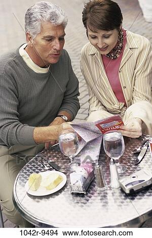 people, couple, outdoors, Middle-aged, dining out, vacation, tourists View Large Photo Image Picture - people, couple, outdoors, Middle-aged, dining out, vacation, tourists. Fotosearch
