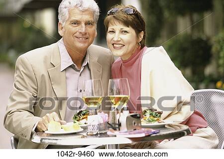 people, couple, outdoors, Middle-aged, dining out, alcoholic, Caucasian View Large Photo Image Stock Image - people, couple, outdoors, Middle-aged, dining out, alcoholic, Caucasian. Fotosearch