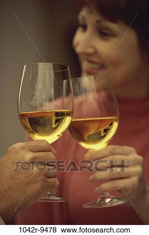 people, couple, toasting, wine, Middle-aged, alcoholic, toast View Large Photo Image Stock Photo - people, couple, toasting, wine, Middle-aged, alcoholic, toast. Fotosearch