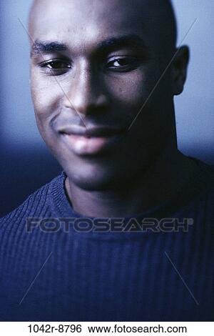 Stock Photograph - people, fashion, indoors, headshot, African-American, young adult. Fotosearch