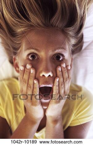 Stock Photo - people, fear, surprise, blond, frightened, surprised. Fotosearch
