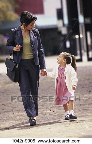 Stock Photography - people, hands, walking, mother, Hispanic, holding, outdoors. Fotosearch