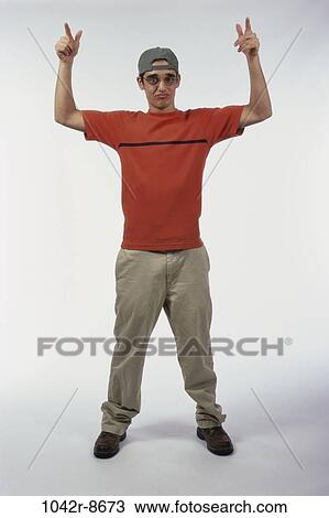 people, hat, male, eyeglasses, gesturing, pointing, point View Large Photo Image Stock Image - people, hat, male, eyeglasses, gesturing, pointing, point. Fotosearch