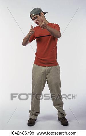 Stock Image - people, hat, male, eyeglasses, gesturing, pointing, point. Fotosearch