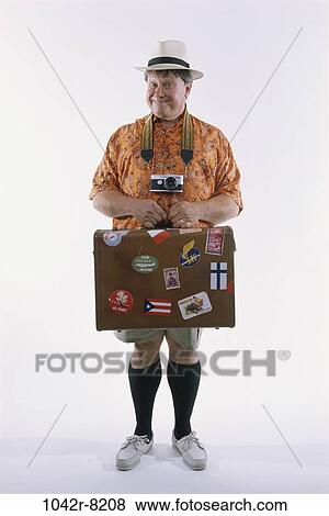 people, hat, Middle-aged, vacations, camera, humor View Large Photo Image Stock Photo - people, hat, Middle-aged, vacations, camera, humor. Fotosearch